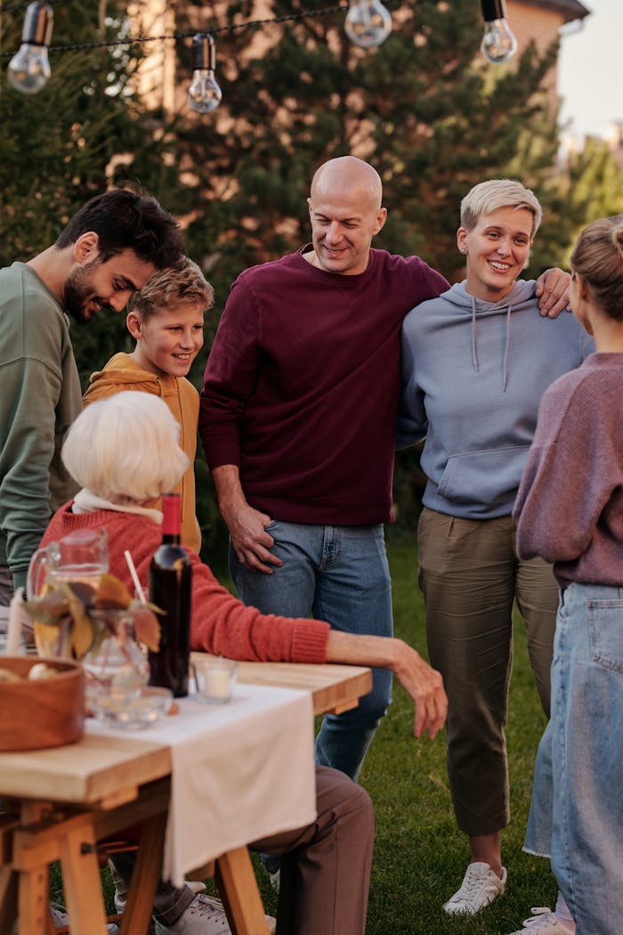 Family gathering for picnic on terrace